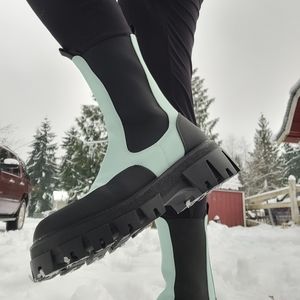 Akira winter boots with thick tread.